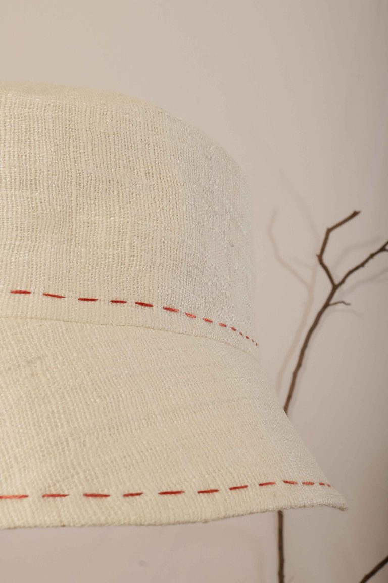 Eri Silk unisex Bucket Hat, Handspun and handwoven Eri Silk with embroidery stitch detail.
