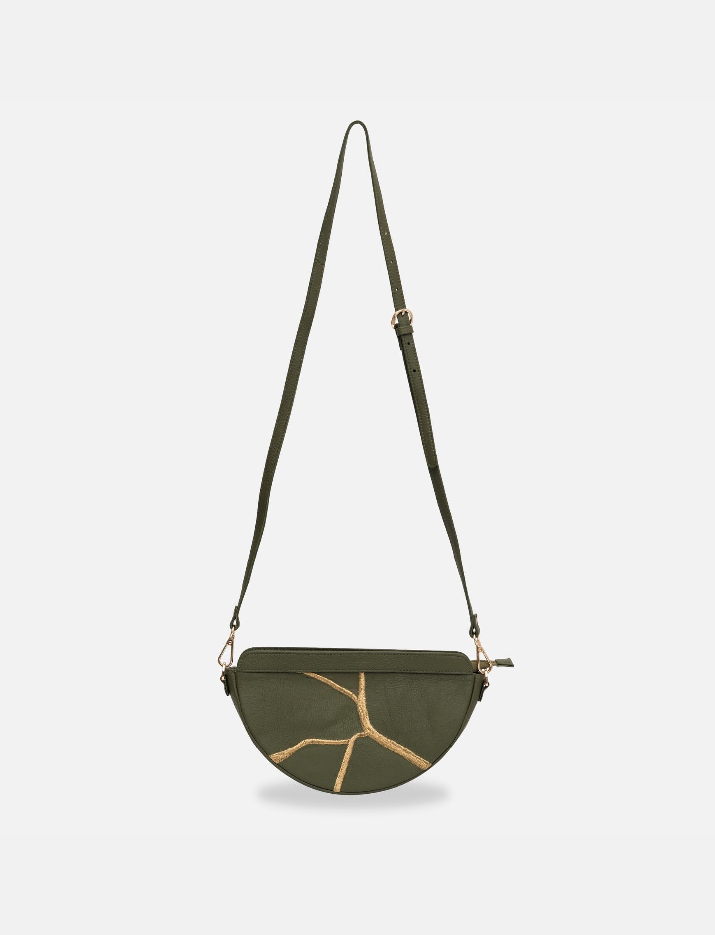 Olive green upcycled leather women's adjustable sling bag with gold embroidery.