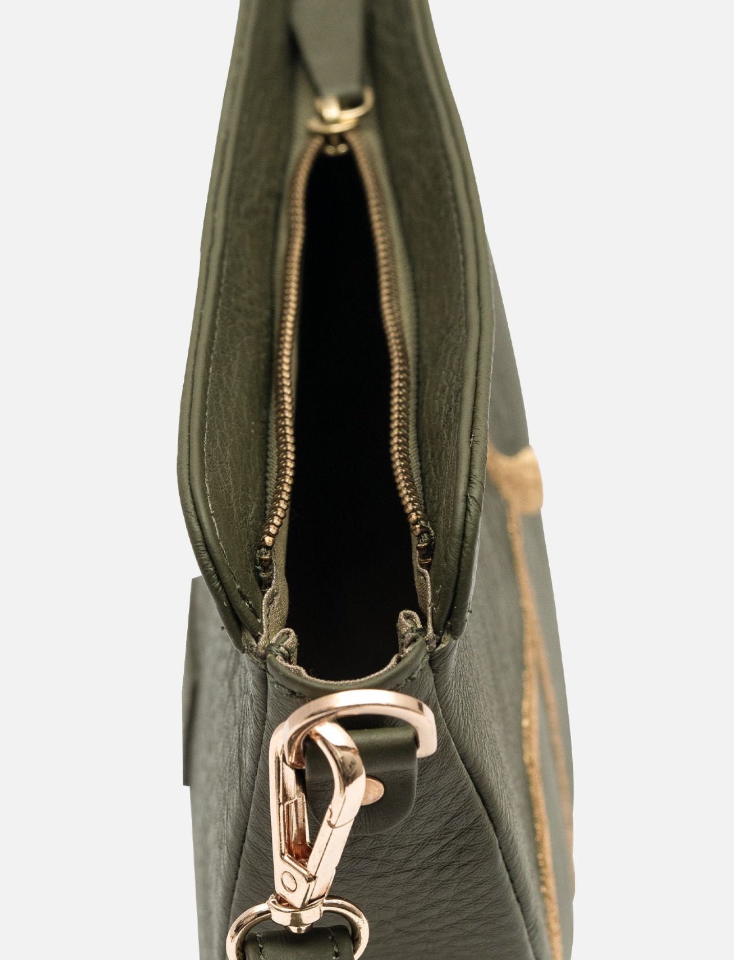 Olive green upcycled leather women's adjustable sling bag with gold embroidery.