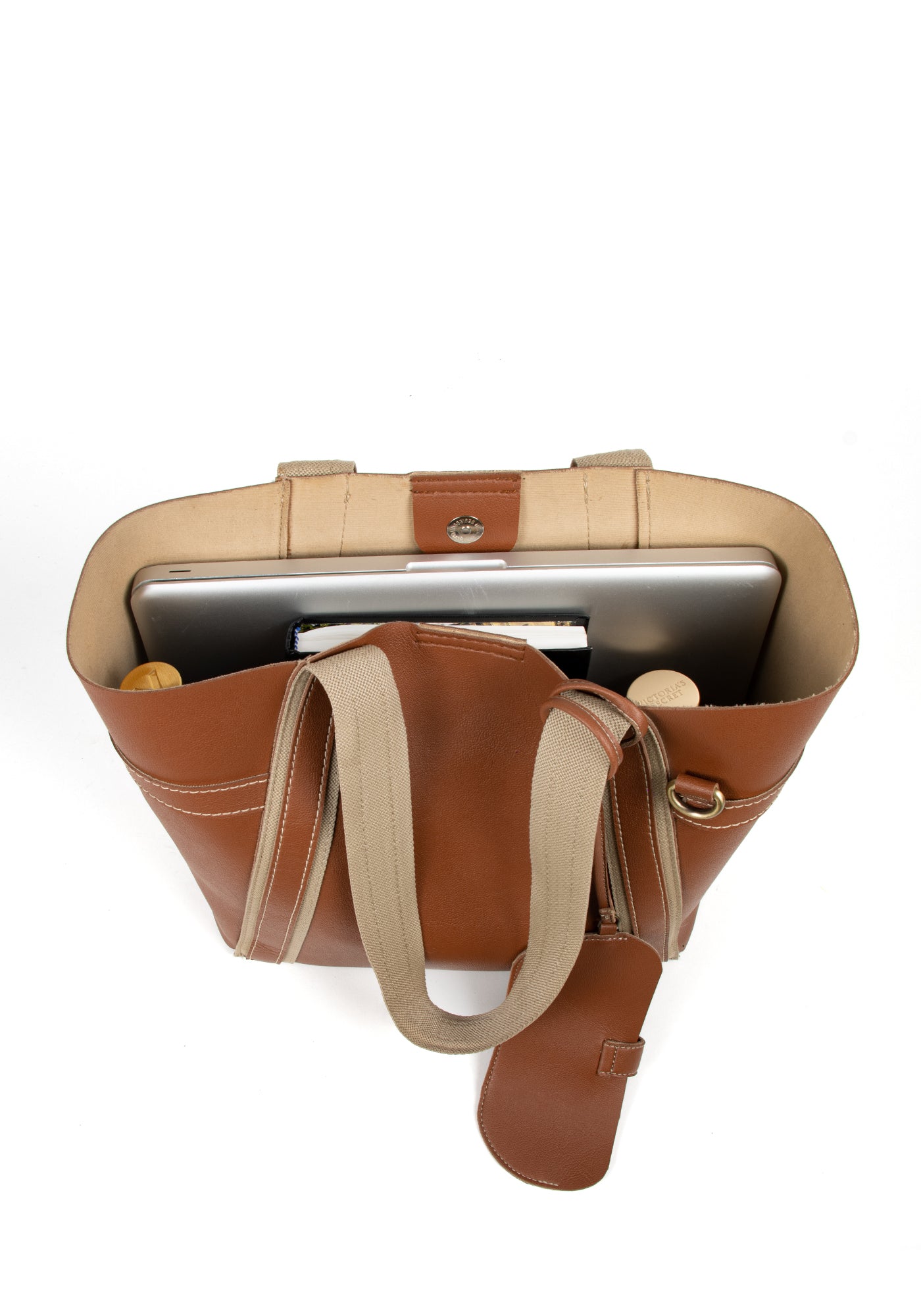 Spacious Tan brown tote bag for daily use made by conscious and vegan leather.