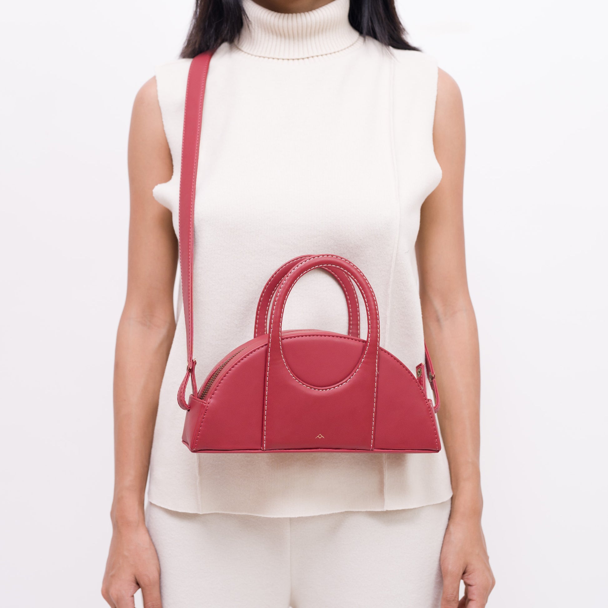 Half moon beige bag for women made with conscious and vegan leather.