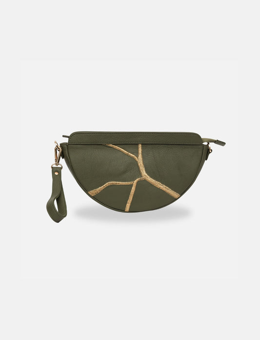 Olive green upcycled leather women's adjustable sling bag with gold embroidery.