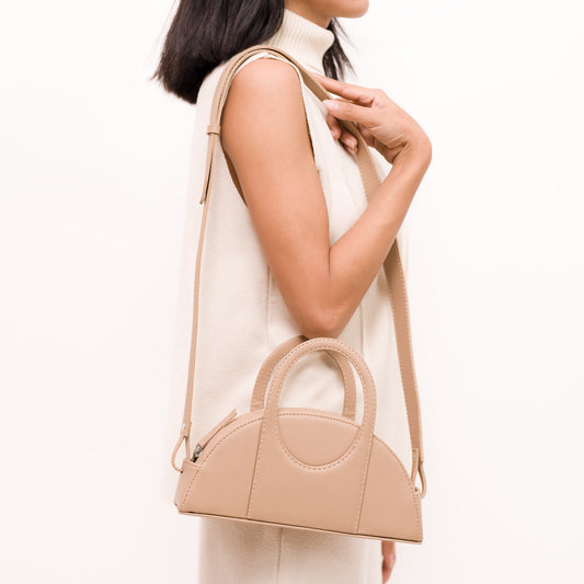 Half moon beige bag for women made with conscious and vegan leather.