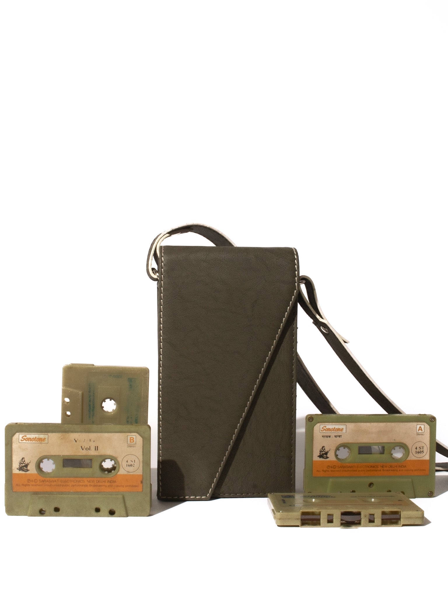 The record sling phone olive green made with conscious and vegan leather.