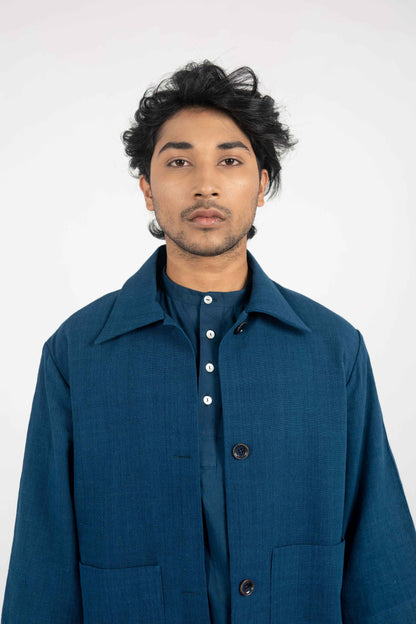 A Minimalist Indigo Eri Silk jacket.
