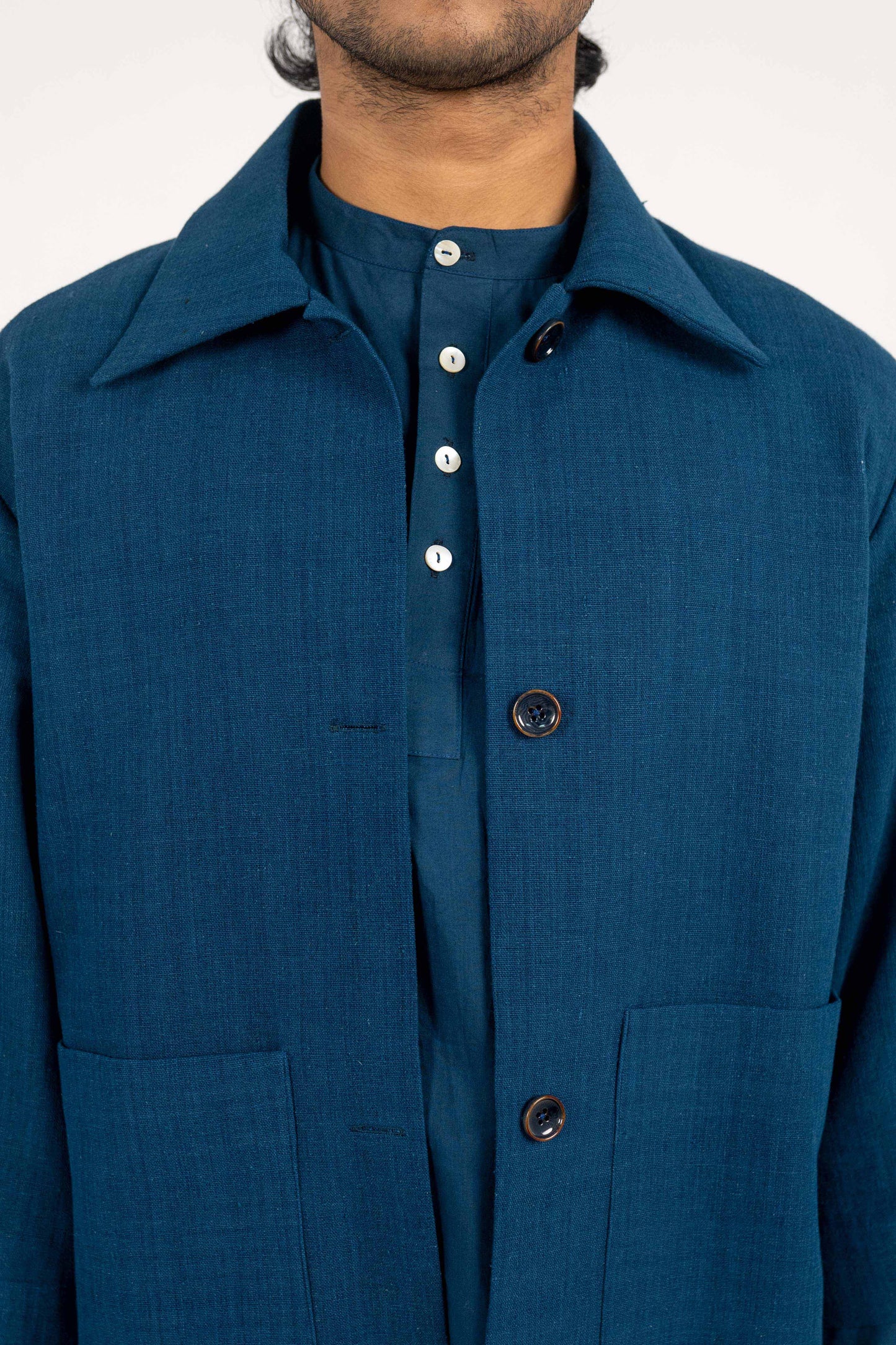 A Minimalist Indigo Eri Silk jacket.