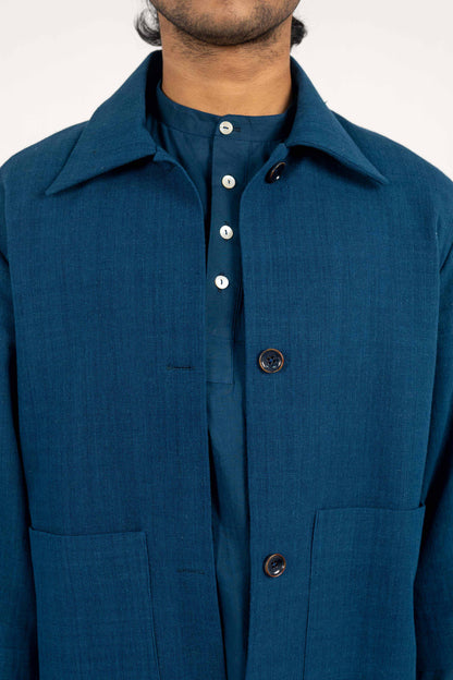 A Minimalist Indigo Eri Silk jacket.
