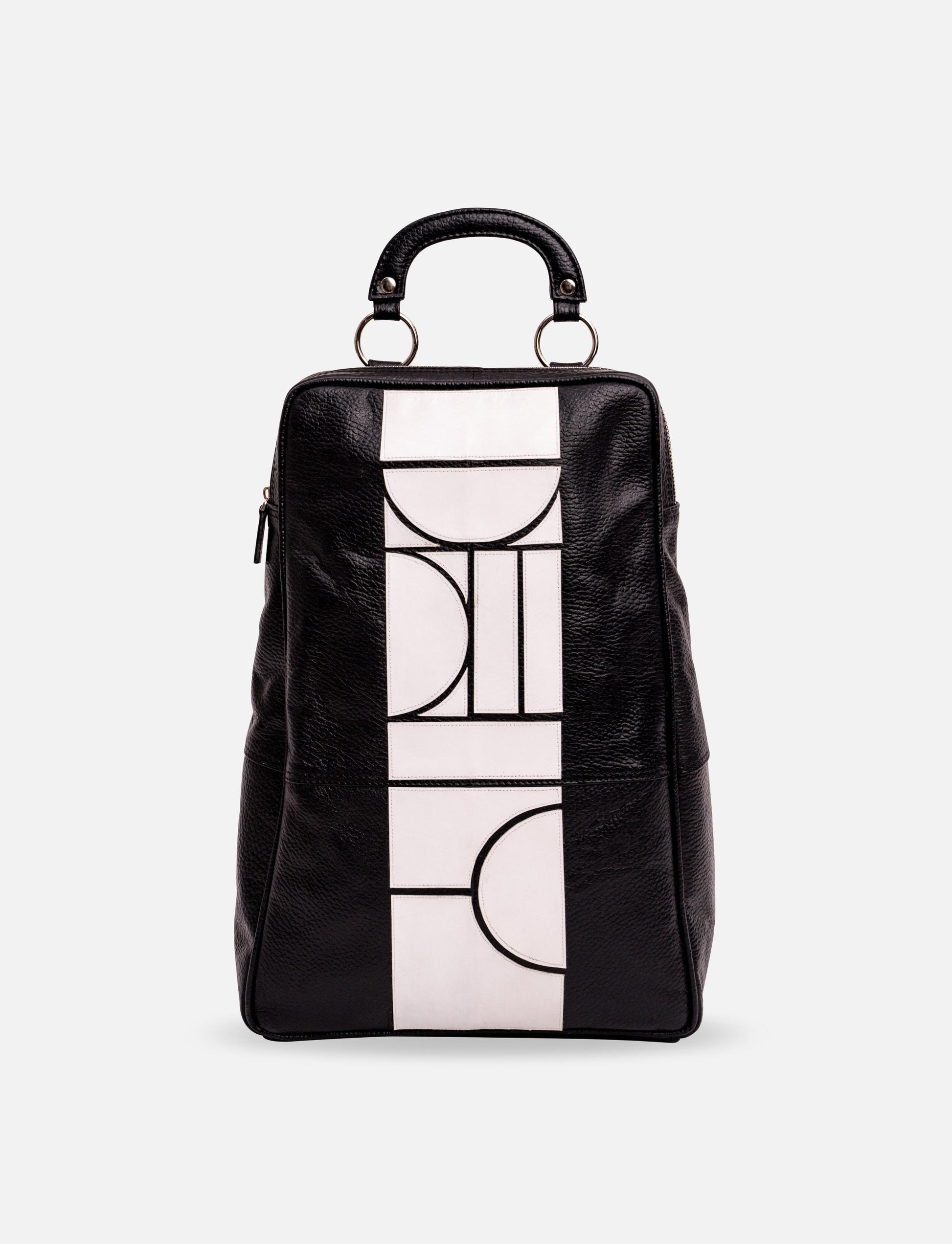 Black and white upcycled leather adjustable unisex bagpack.