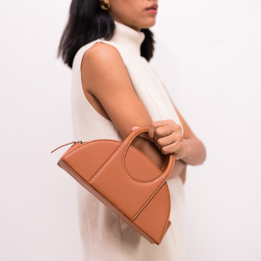 Half moon beige bag for women made with conscious and vegan leather.